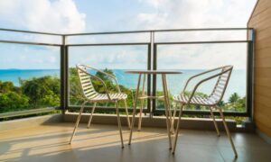 Balcony with waterproof flooring and ocean view